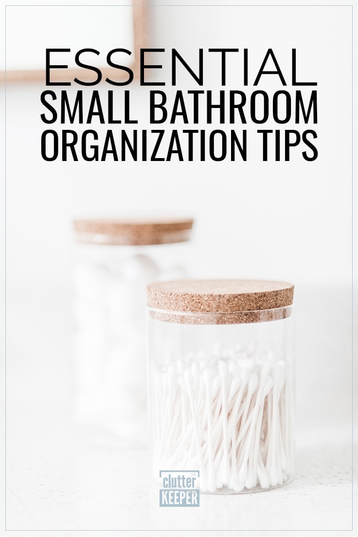 Essential Small Bathroom Organization Tips, two glass jars filled with cotton Q-tips on a counter in a tiny bathroom