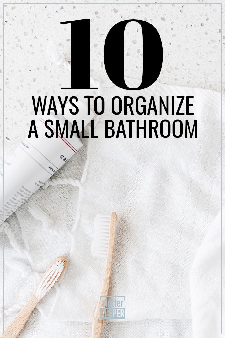 10 Ways to Organize a Small Bathroom, two wooden toothbrushes and toothpaste on a linen towel in a tiny bathroom