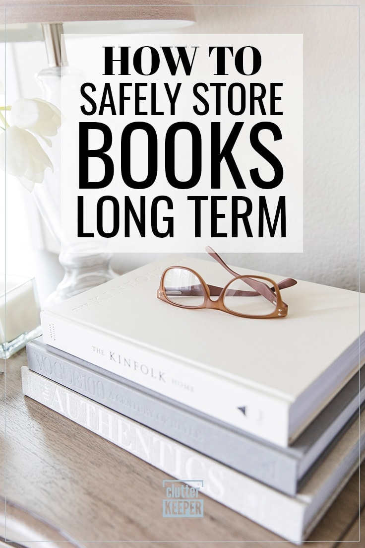 How to Safely Store Books Long Term, A pair of reading glasses sitting on top of three books stacked on top of a nightstand in a bedroom, next to a lamp