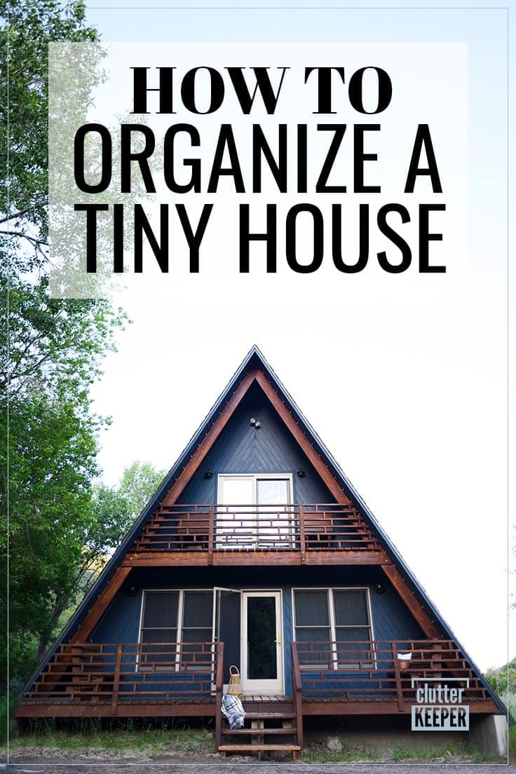 How to Organize a Tiny House, small blue a-frame home or cabin