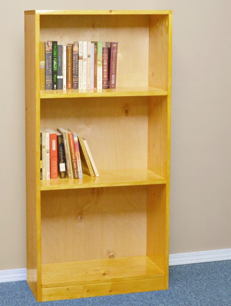 A homemade wooden bookshelf from 5 Minutes For Mom