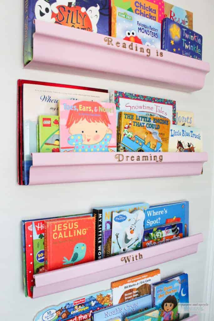 DIY bookshelves made out of rain gutters